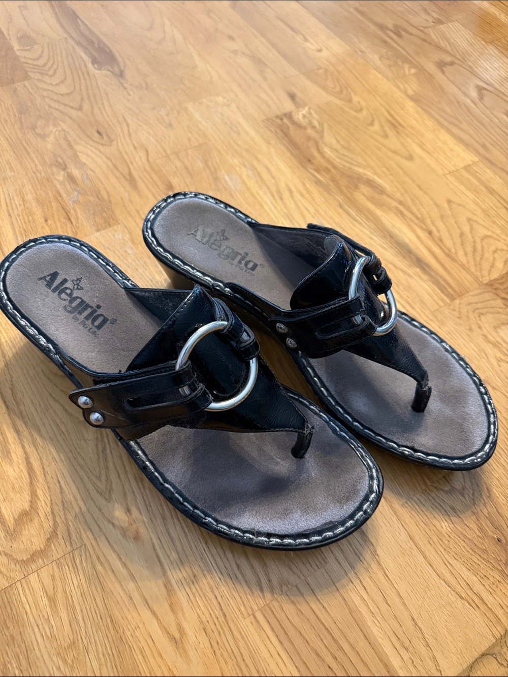 Alegria Black Leather Ring-Accent Thong Sandals